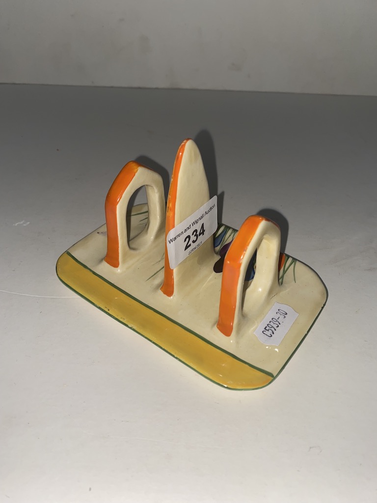 A Clarice Cliff Bizarre Art Deco crocus pattern toast rack