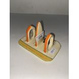 A Clarice Cliff Bizarre Art Deco crocus pattern toast rack