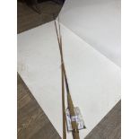 A Hardy 'Palakona' two piece cane fly fishing rod by Hardy Bros with two tip sections, eyelets not