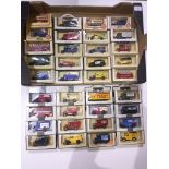 A box of 36 model vehicles, all boxed, most Lledo