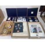 Collection of gold plated over-sized coins/ medallions, some boxed and various stamps, mostly trains