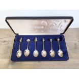 A set of six hallmarked silver Silver Jubilee commemorative spoons each with a different novelty