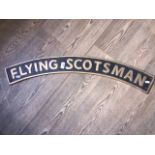 A cast iron 'FLYING SCOTSMAN' sign