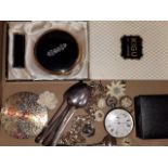 A mixed lot comprising hallmarked silver spoons, a silver pocket watch, vintage compacts, costume