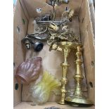 Box containing brass light fittings, two glass shades and brass candle sticks