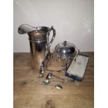 A mixed lot comprising a silver plated jug height 27cm, a silver plated egg coddler and a set of