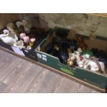 Two boxes of Sylvac items to include money banks, elephants, swan and jugs etc.