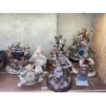 A collection of 8 Capo Di-Monte statues