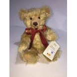 A Steiff Limited Edition Celebration Teddy Bear (unboxed) wearing embroidered ribbon 1880-2005 and