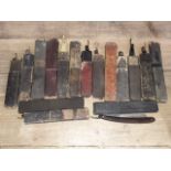 A quantity of vintage cut throat razors.