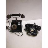 An old Ericksson type telephone and an old Belgian bell telephone
