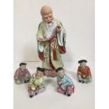 A set of five Chinese porcelain figures.