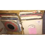 Box containing 1980s singles, The Faces, Phil Collins, Stevie Wonder etc