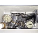 Four assorted wristwatches together with a Zippo lighter and a Ronson table lighter (boxed),