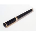 A Cartier ball point pen.