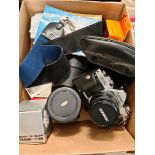 A Cannon AV-1 with accessories to include Vivitar & Ozeck lenses, a Cannon power winder and a