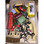 A box of vintage toys to include metal soldiers, metal horsemen soldiers, diecast vehicles and