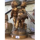 A guilt spelter statue of 2 cherubs