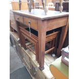 A 1920's oak writing table with 2 drawers and leather top, width 81cm, depth 50.5cm and height 72.