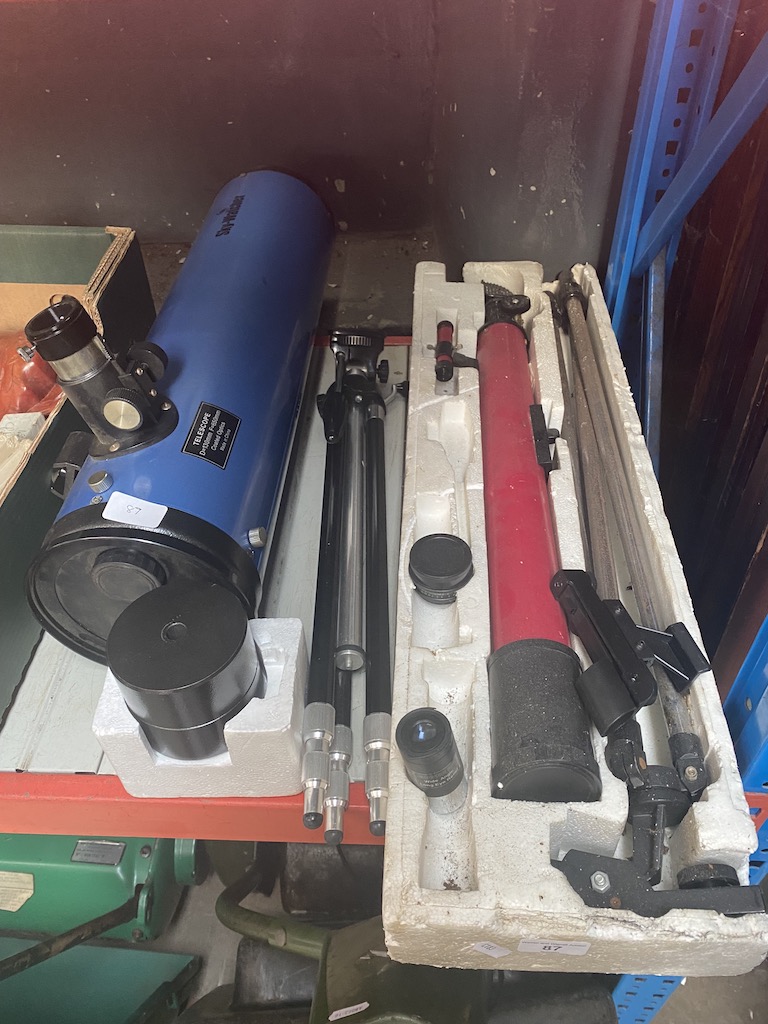 A Tasco telescope in a box, camera tripod and a Skywatcher telescope (AF)