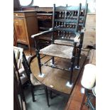 An 18th century oval joined oak gate leg table with pad feet, together with four spindle back and
