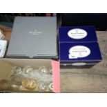 A boxed Royal Doulton set of 4 crystal glasses, a Waterford crystal bowl and a box of glasses.
