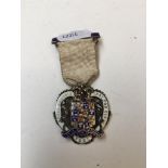 A hallmarked silver medal marked Royal Masonic Inst for Girls 1923