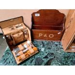 A wooden letter tidy marked P & O and a vintage grooming kit marked E.C.C.W