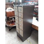 A large metal cabinet of drawers.