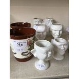 Collection of spitting image egg cups and two preston Guild mugs