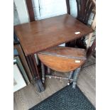 An Edwardian inlaid mahogany nest of three tables and a Victorian Sutherland table.