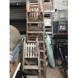 3 pairs of wooden stepladders - 2 small and 1 medium.