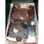 A tin of approx 100 victorian pennies/halfpennies and a tin of post decimal half pennies, with a