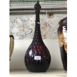 Tall purple glass vase with stopper
