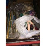 A box of various knitting and sewing items