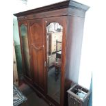 An Edwardian inlaid mahogany wardrobe, width 182cm, depth 60cm and height 215cm