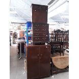 A reproduction mahogany chest and a tallboy.