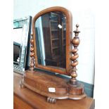 A victorian mahogany toilet mirror with twist pillars.