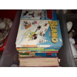 Box containing Beano books and others