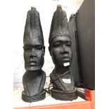A pair of African carved wooden lamp figures