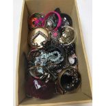 A box of costume jewellery bangles, etc.