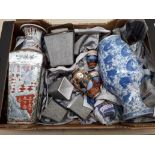 A box of Oriental porcelain and a box of pottery ornaments.