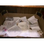 A box of handkerchiefs from around the world - lace, silk and embroidered