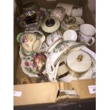 Box containing various items of pottery and glass