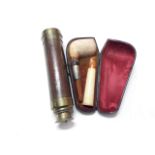 A brass and wood three drawer telescope, together with a silver mounted meerschaum pipe with amber