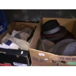 A box of mens vintage shirts and a box of vintage hats and ladies gloves