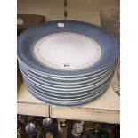 A set of eleven large Denby Castile dishes.