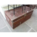 A mahogany shipping trunk.