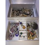 A white jewellery box with costume and vintage jewellery