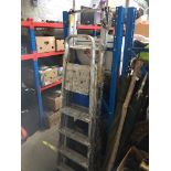 A 3 way aluminium ladder and another aluminium ladder.